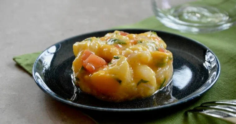Fish tartare with mango and vanilla oil